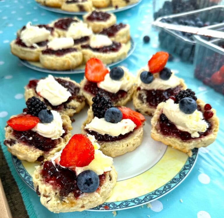 Scones with fresh cream and berries from the garden